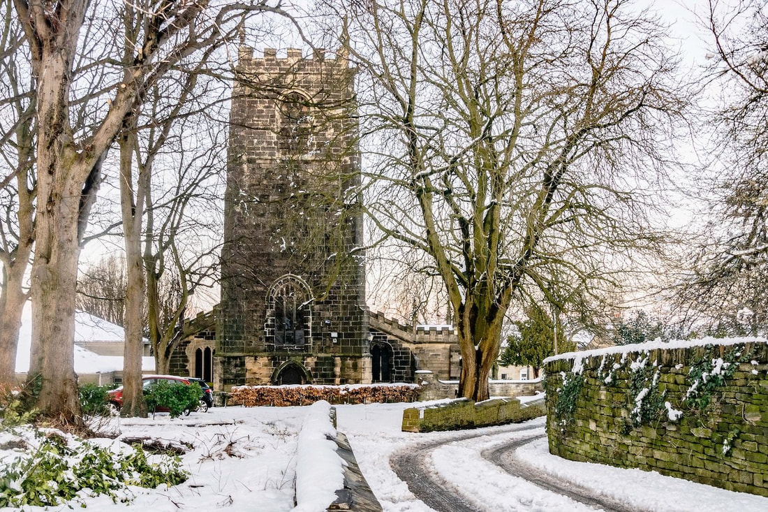 Almondbury Parish church under snow.