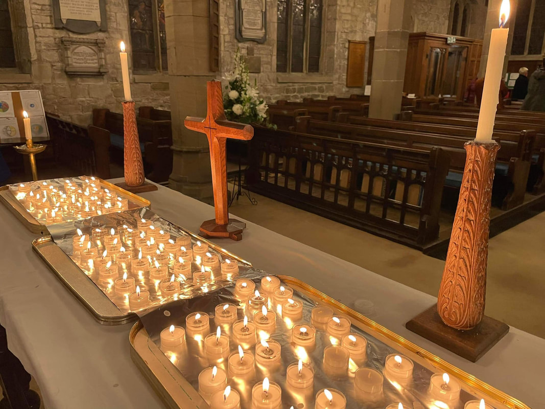 Candles on the alter for All Souls day