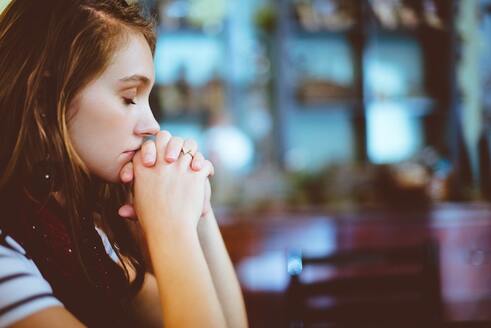 A woman in prayer