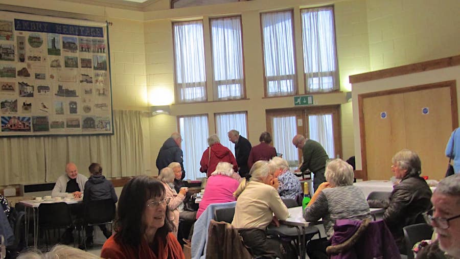A meeting in the church hall at All Hallows'