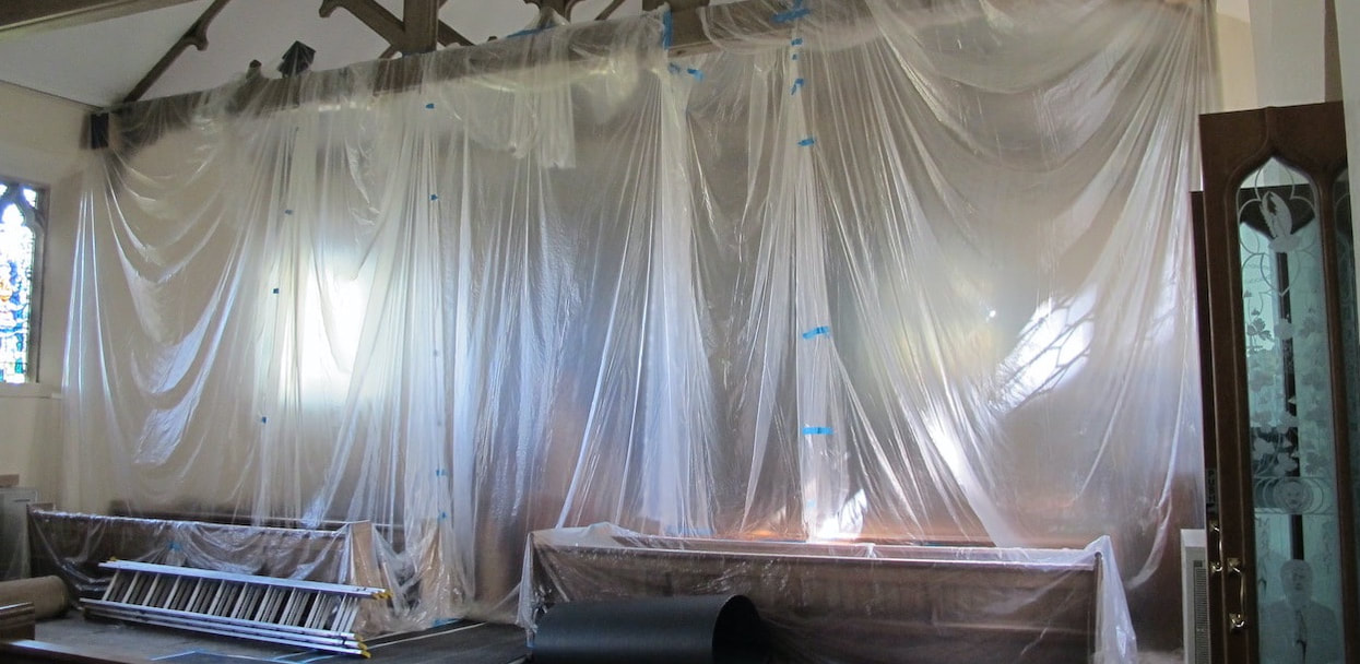 plastic sheeting across the nave